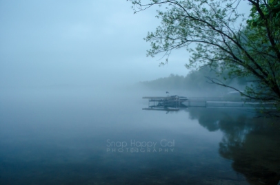 Photo: boat dock on Torch Lake, foggy morning