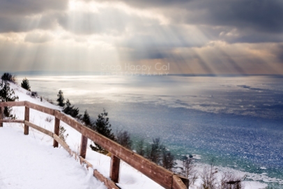 Photo: Sun rays shine down on a freezing Lake Michigan