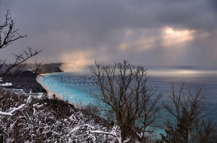 Photo: lake effect snow, sun rays, Lake Michigan