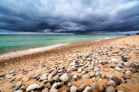 Photo: Dark clouds, Lake Michigan beach with stones