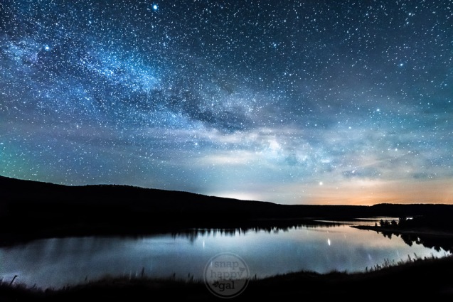 The core of the Milky Way hovers above the placid waters of North Bar Lake in the Sleeping Bear Dunes National Lakeshore