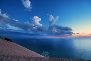 Dramatic clouds and twilight over Lake Michigan from atop a Sleeping Bear Dunes overlook